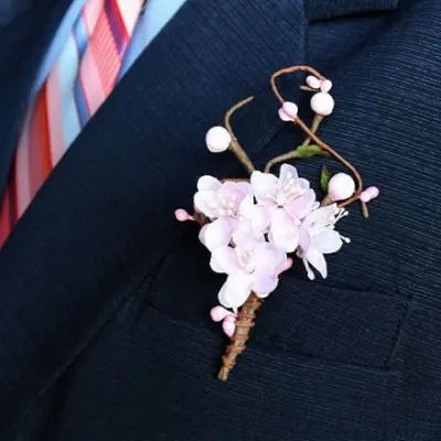 Three Different Methods to Putting on a Wedding Boutonniere